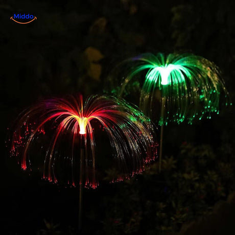 fontaine solaire fiber optic avec changement de couleur rouge et vert dans le jardin