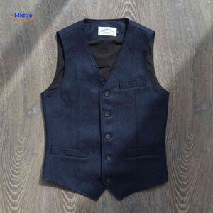 face avant du gilet laine tweed coloris bleu, motif chevron distinctif