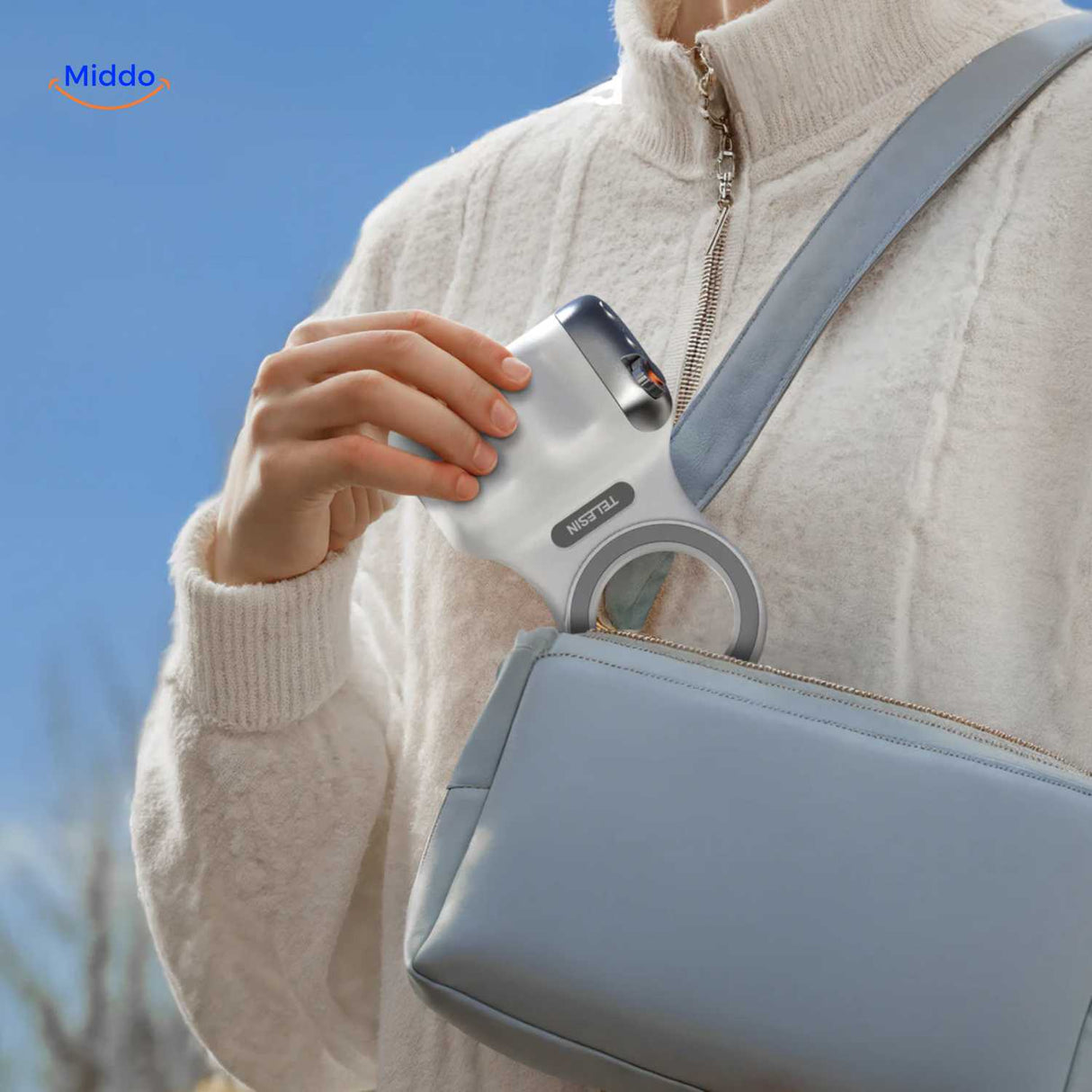grip magnétique bluetooth compact qui tient facilement dans un sac pour la photo en déplacement