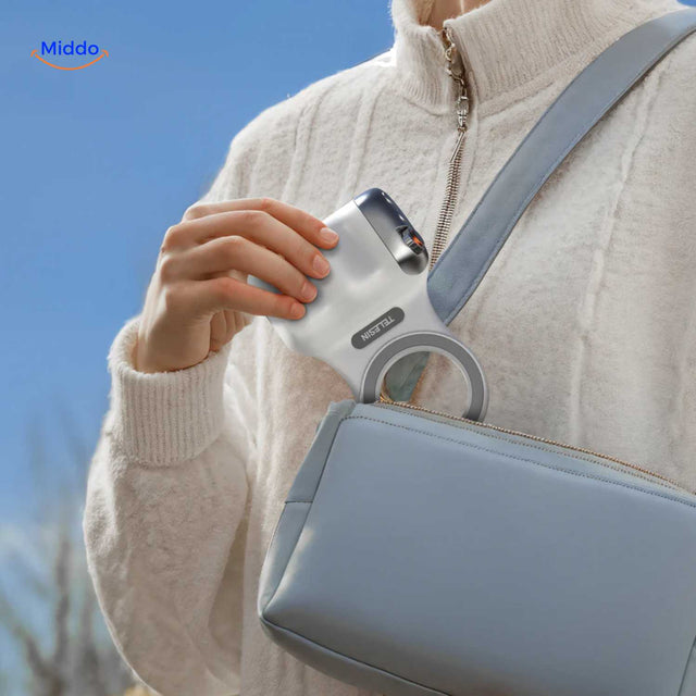 grip magnétique bluetooth compact qui tient facilement dans un sac pour la photo en déplacement