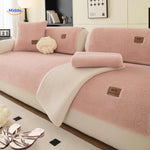 housse canapé effet laine coloris rose avec tissu chaud et plaids assortis