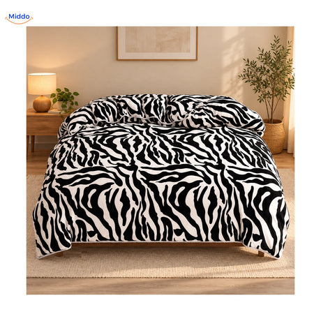 Housse de couette en peluche : motif zèbre sur le lit