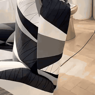 housse extensible pour fauteuil relax avec motif géométrique noir, blanc et gris, vue en situation