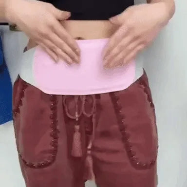 coussin chauffant huggy en action avec fonction massage therapie pour douleurs abdominales