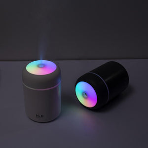humidificateur d'air magic air en version noire et blanche, éclairage LED doux pour une ambiance nocturne relaxante