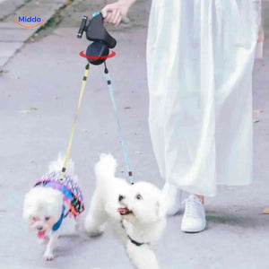 laisse rétractable double avec système anti-embrouillement pour promener deux chiens sans nœuds