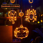 guirlande led halloween avec citrouille, araignée et oeil, décoration lumineuse orange pour fenêtre
