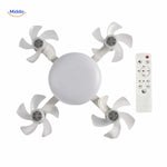 vue de dessus de la lampe ventilateur montrant les quatre pales et la télécommande