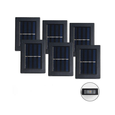 set de six lampes solaires LED extérieures alignées sur fond blanc