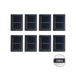 Acht zonnepaneel buitenlampen in een rij op een witte achtergrond.