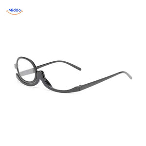 lunettes maquillage pivotantes noir brillant, vue de face sur fond épuré