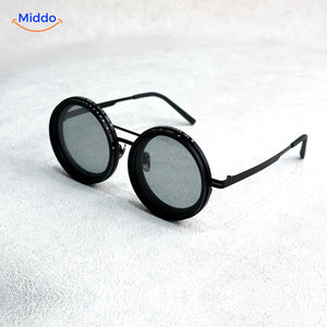lunettes de soleil noires à monture métallique, vue de face, filtre lumineux réglable ND9