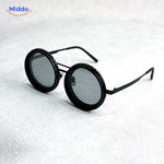 lunettes de soleil noires à monture métallique, vue de face, filtre lumineux réglable ND9