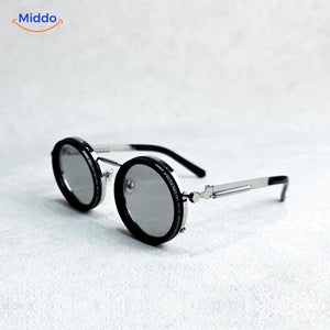 lunettes de soleil rondes à monture métallique argentée, design épuré protection UV