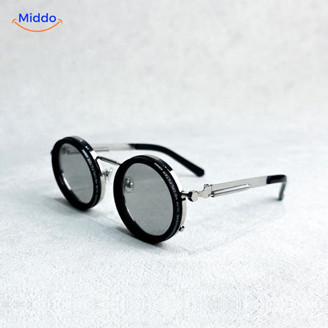lunettes de soleil rondes à monture métallique argentée, design épuré protection UV