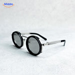 lunettes de soleil rondes à monture métallique argentée, design épuré protection UV