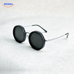 lunettes de soleil rondes artisanales à monture noire en métal, verres teintés protection UV