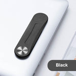 Zwarte magnetische clip bevestigd aan een laptop voor telefoongebruik.