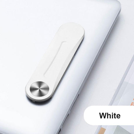 clip magnétique blanc fixé sur un ordinateur portable comme support pour smartphone