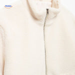manteau teddy blanc, gros plan fermeture éclair centrale de qualité