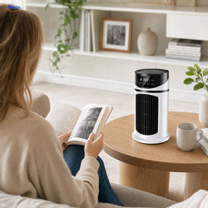 BreezeMist ventilateur USB de table avec brumisation: femme lisant un livre près du ventilateur.