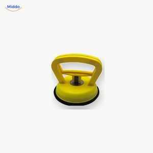 DentGrip ventouse à verrouillage: modèle jaune sur fond blanc.