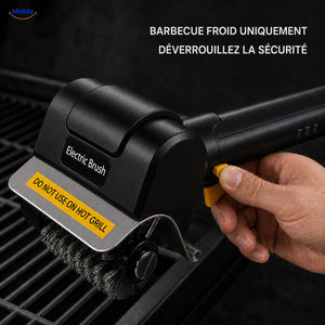 GrillMaster brosse électrique pour barbecue: détail du bouton de sécurité jaune.