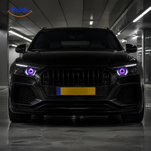 NightStare décoration LED pour optiques de phare: vue de face d’une voiture avec yeux violets dans un garage.