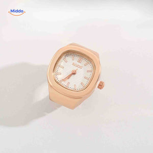 montre-bague en or rose avec cadran blanc, design délicat et sophistiqué
