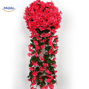orchidées artificielles rouges suspendues au mur, accent de couleur intense pour toute occasion