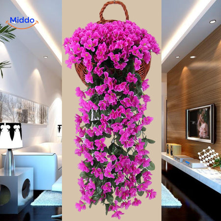 orchidées artificielles violettes intégrées dans une décoration de style hôtel, ambiance raffinée et luxueuse