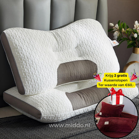 oreiller cervical ergonomique avec 2 taies en velours bordeaux offertes, sur un lit