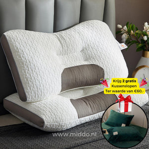 oreiller cervical ergonomique avec 2 taies en velours vert foncé offertes, sur un lit