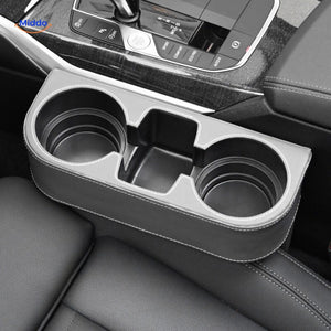organisateur auto en cuir noir avec coutures rouges contrastées, design sport