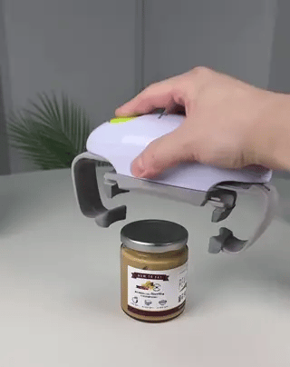 ouvre-bocal automatique sur un pot de miel, couvercle retiré en un seul clic
