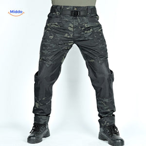 pantalon tactique noir camouflage, coupe robuste et fonctionnelle pour l'aventure