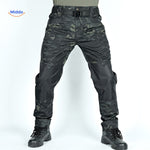 pantalon tactique noir camouflage, coupe robuste et fonctionnelle pour l'aventure