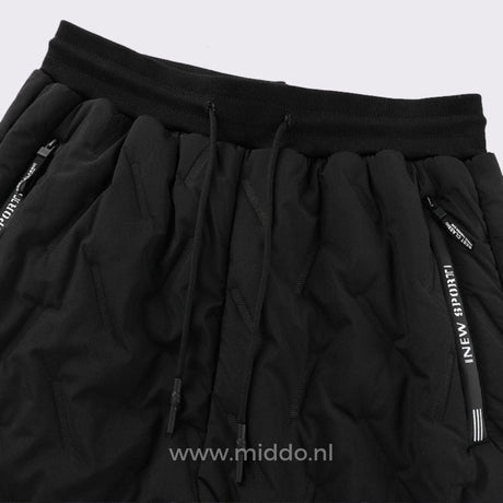 pantalon thermo noir avec ceinture élastique réglable visible au premier plan