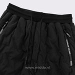 pantalon thermo noir avec ceinture élastique réglable visible au premier plan
