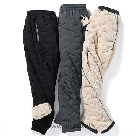 trois pantalons thermo unisexes présentés en différents coloris avec doublure retournée