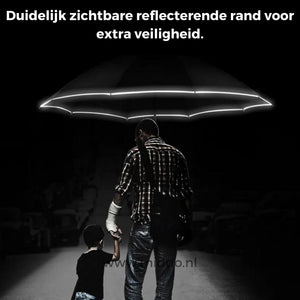 homme et enfant sous un parapluie à bord réfléchissant pour une meilleure visibilité et sécurité la nuit