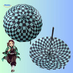 parasol anime vert et noir vu de dessus, motif personnage visible sur toute la surface