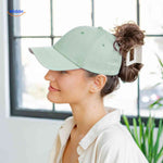 ponylite pet lichtgroene damespet met klip en haaropening trendy bun www.middo.nl