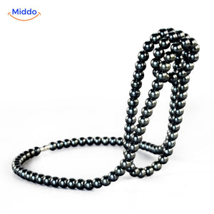 porte-bouteille design avec perles sombres et effet bijou, vue en situation