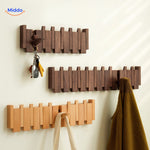 crochets multifonctions du porte-manteaux piano en bois artisanal, robustes et pratiques