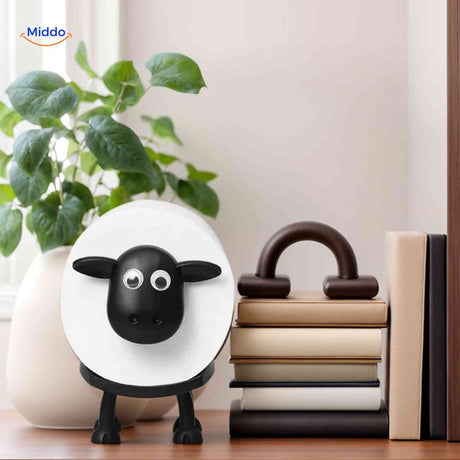 porte-rouleau design mouton utilisable sur un bureau ou dans la salle de bain