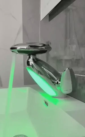 robinet extensible chrome avec éclairage LED vert monté sur plan vasque