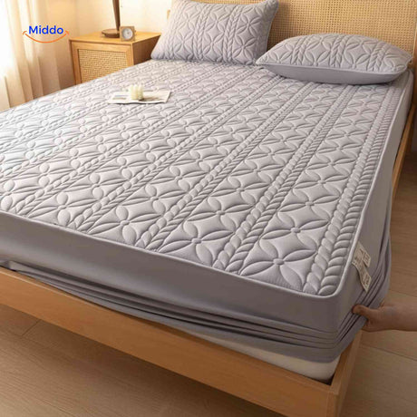 détail des coins élastiques extensibles du protège-matelas assurant un maintien parfait