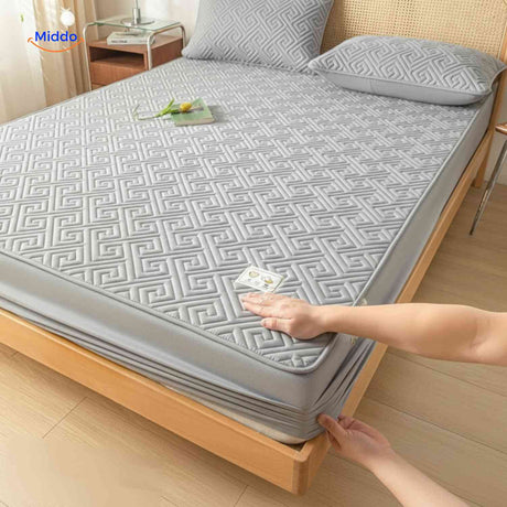 protège-matelas avec coins extensibles permettant une installation rapide et facile sur le matelas