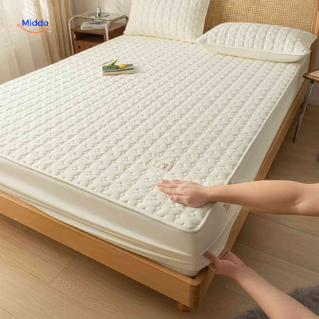 protège-matelas à double couche matelassée offrant confort et protection renforcée du matelas